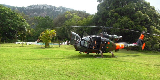 A helicopter on The Outspan Inn's lawns